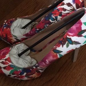 Floral peep toe heel.